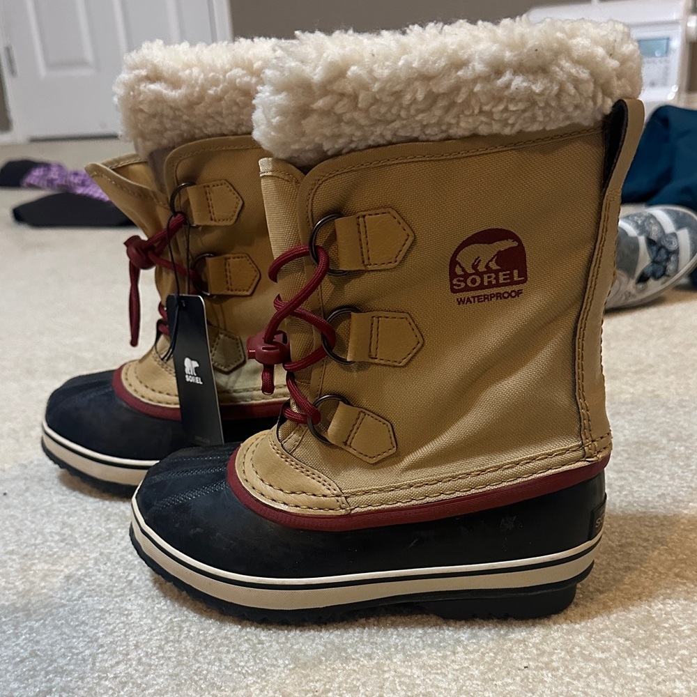 Sorel Tan and Black Winter Boots with Red Accents